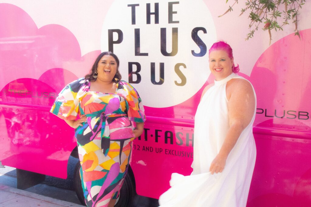 Marcy & Jen in front of the official "Plus Bus"